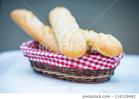 Baguette in a basket 114128462