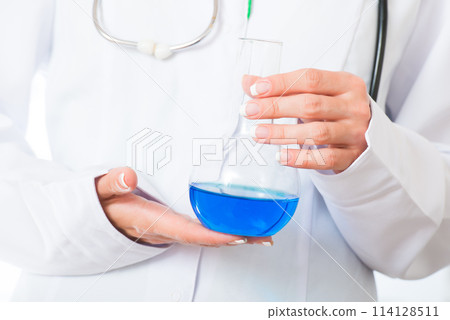 Doctor's hands with flask 114128511