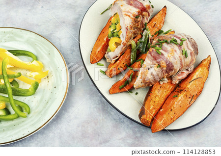 Meat roll and roasted sweet potatoes. Meat roll and roasted sweet potatoes. 114128853