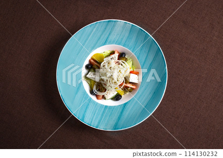 Fresh Greek Salad with Feta Cheese, Tomatoes, Cucumbers, and Olives 114130232