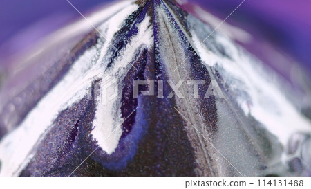 Glitter pyramid. Paint drop. Defocused neon blue purple white color glowing shimmering particles texture ink drip geometric abstract art background. Glitter pyramid. Paint drop. Defocused neon blue purple white color glowing shimmering particles texture ink drip geometric abstract art background. 114131488