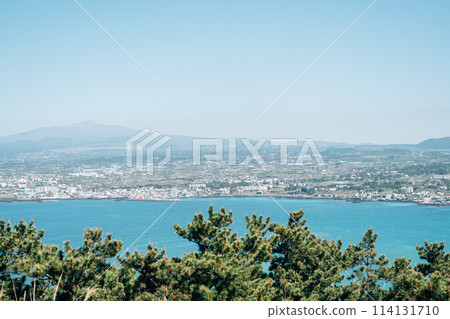 Jeju Oreum and seaside city view from Biyangdo Island Biyangbong peak in Jeju island, Korea Jeju Oreum and seaside city view from Biyangdo Island Biyangbong peak in Jeju island, Korea 114131710