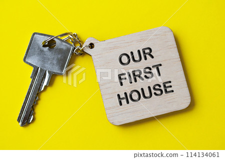 Our first house text engraved on wooden key chain. 114134061