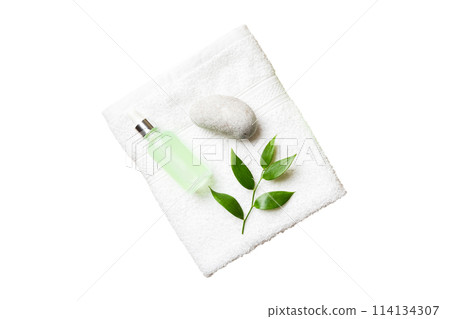 Coconut with jars of coconut oil and cosmetic cream isolated on white background. Top view. Free space for your text. Natural spa coconut cosmetics and organic treatment concept 114134307