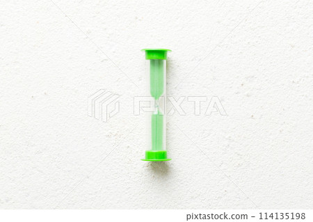 hourglass on the table, sand clock as time passing concept for business deadline, copy space 114135198