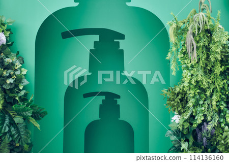 Half a hole from a shampoo bottle with flowers to showcase your products. Concept: template and background design with the ability to copy. High quality photo Half a hole from a shampoo bottle with flowers to showcase your products. Concept: template and background design with the ability to copy. High quality photo 114136160