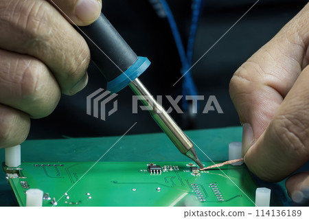 Close up scene the soldering operation by skill operator. 114136189