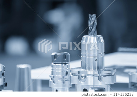 Close-up scene rough  utter  end mill tool with the holder in the light blue scene. 114136232