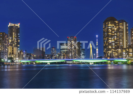 Illuminated bridges on the Sumida River and cityscape Tokyo night view 114137989