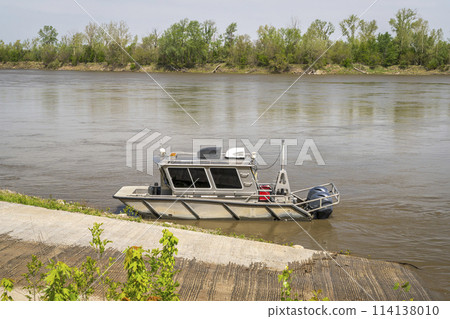aluminum working boat at a ramp on the MIssouri River at Waverly, MO aluminum working boat at a ramp on the MIssouri River at Waverly, MO 114138010