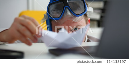Man wearing suit and tie in goggles and snorkel Man wearing suit and tie in goggles and snorkel 114138197