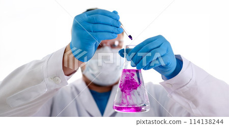 A male chemist holds test tube of glass 114138244