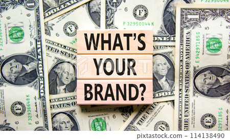 Branding and what is your brand symbol. Concept words What is your brand on beautiful blocks. Dollar bills. Beautiful dollar bills background. Business branding what is your brand concept. Copy space. 114138490