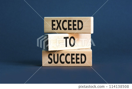 Exceed to succeed symbol. Concept words Exceed to succeed on beautiful wooden blocks. Beautiful grey table grey background. Business and exceed to succeed concept. Copy space. Exceed to succeed symbol. Concept words Exceed to succeed on beautiful wooden blocks. Beautiful grey table grey background. Business and exceed to succeed concept. Copy space. 114138508