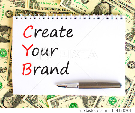 CYB Create your brand symbol. Concept words CYB Create your brand on beautiful white note. Dollar bills. Beautiful dollar bills background. Business CYB Create your brand concept. Copy space. CYB Create your brand symbol. Concept words CYB Create your brand on beautiful white note. Dollar bills. Beautiful dollar bills background. Business CYB Create your brand concept. Copy space. 114138701
