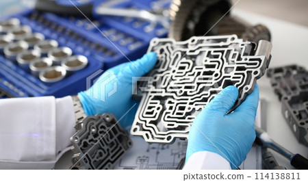 The auto repair service repairman in automatic The auto repair service repairman in automatic 114138811