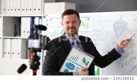 Male in suit and tie show stats graph pad Male in suit and tie show stats graph pad 114138918