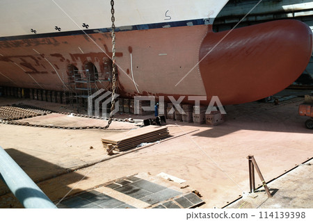Large Ship Bow in Dry Dock for Repairs 114139398