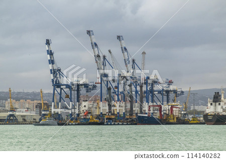 Novorossiysk, Russia 08.18.2023. Port cranes, Black Sea, port, Krasnodar Territory, Novorossiys Novorossiysk, Russia 08.18.2023. Port cranes, Black Sea, port, Krasnodar Territory, Novorossiys 114140282
