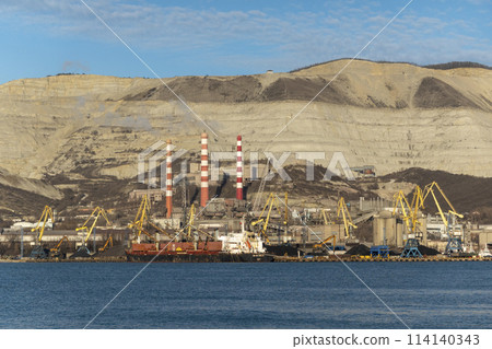 Novorossiysk, Russia 08.18.2023. Port cranes, Black Sea, port, Krasnodar Territory, Novorossiys Novorossiysk, Russia 08.18.2023. Port cranes, Black Sea, port, Krasnodar Territory, Novorossiys 114140343
