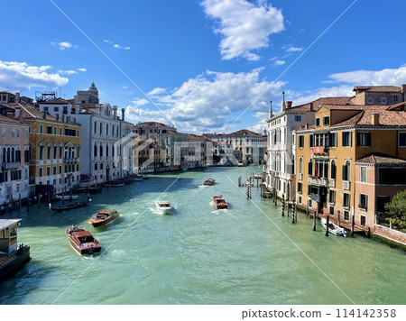 View on the Grand Canal, the most famous channel of Venice between the islands of the lagoon View on the Grand Canal, the most famous channel of Venice between the islands of the lagoon 114142358