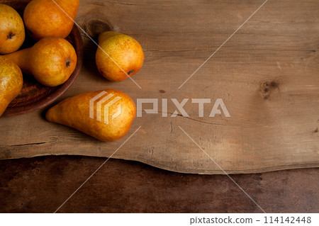 Pears on wooden background as background image.. Pears on wooden background as background image.. 114142448