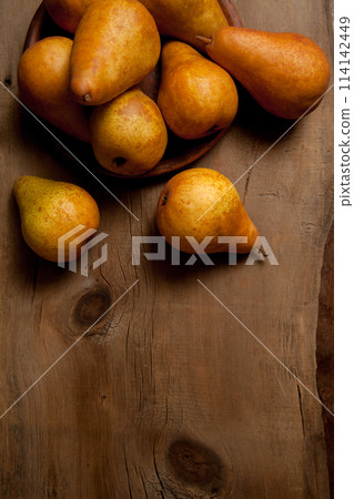 Pears on wooden background as background image.. 114142449