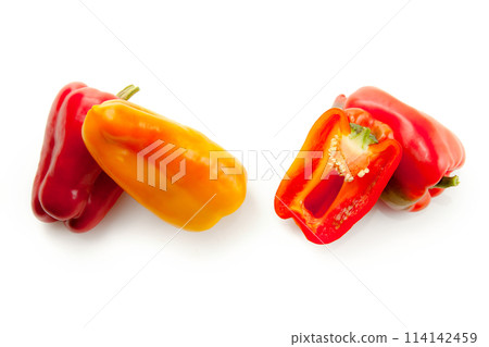 Whole and halves of bell pepper isolated on white background with clipping path. . 114142459