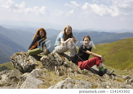 a group of girls tourists 114143302