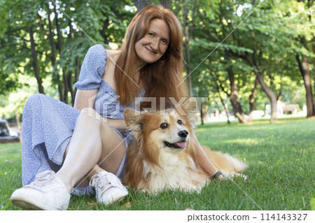 beautiful corgi dog and girl beautiful corgi dog and girl 114143327