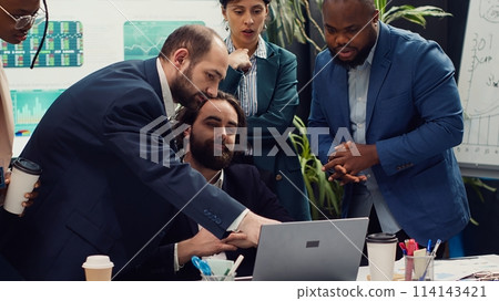 Research team presenting all insight and statistics data they found online, briefing their manager about the work progress and achievements. Employees showing gathered info. Camera A. 114143421