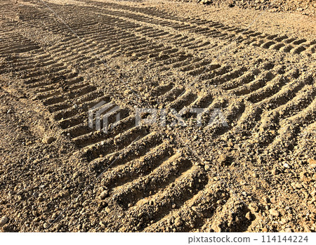 Wheel tracks on the soil. Wheel tracks on the soil. 114144224