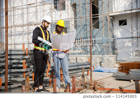 Construction civil engineer man and woman African American checking quality of work 114145003
