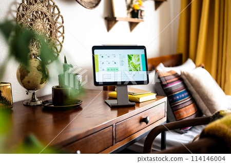 A stylish room with a tablet 114146004