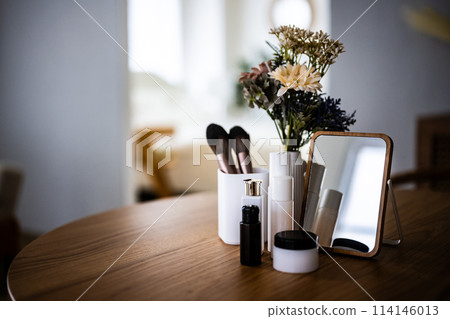 A table with cosmetic items A table with cosmetic items 114146013