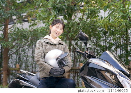 Portrait of a woman riding a bike 114146055
