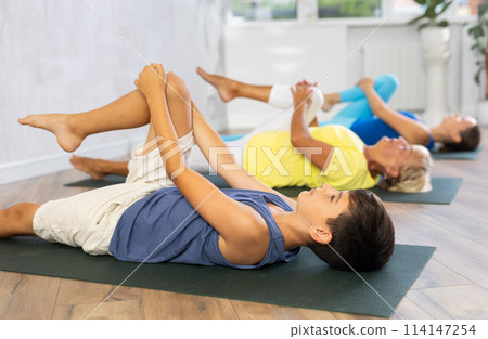 Knees To Chest Pose - Apanasana 114147254