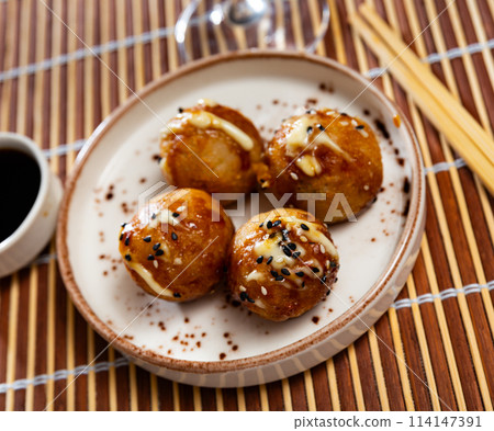 Japanese snack, takoyaki or Octopus balls - Japanese food style closeup 114147391