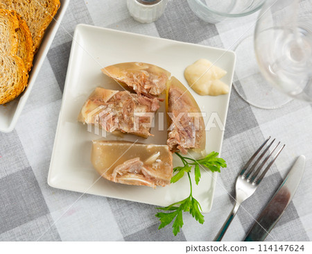 Traditional russian dish kholodets served on plate 114147624