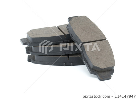 New auto brake pads isolated on white background 114147947
