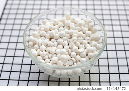 Big tapioca pearls, sago seeds Big tapioca pearls, sago seeds 114148472