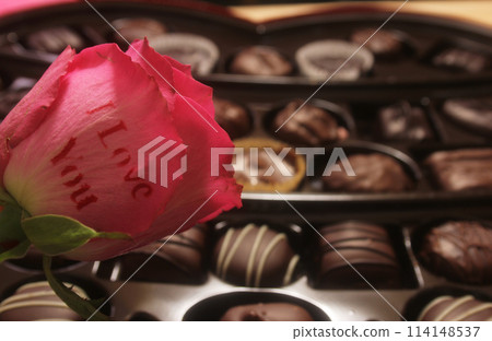 Rose and Box of Assorted Chocolates For Valentines Day 114148537