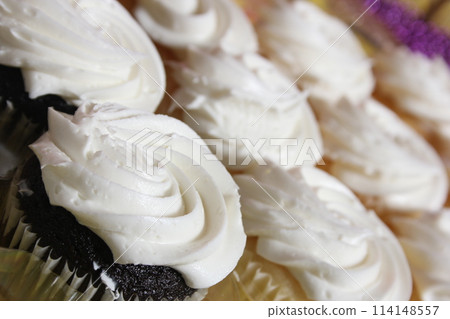 Cupcakes With White Icing on Table at Party or Event 114148557