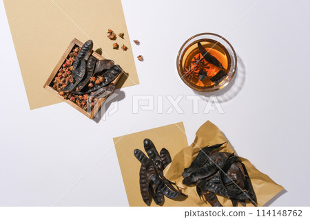 Some ingredients can combine with black locust to produce cosmetic or shampoo scattered arranged on white background with blank space for advertising and view from above Some ingredients can combine with black locust to produce cosmetic or shampoo scattered arranged on white background with blank space for advertising and view from above 114148762