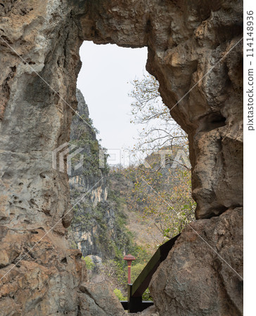 The Phanthurat's Mirror a small natural arch at Khao Nang Phanthurat Forest Park. The Phanthurat's Mirror a small natural arch at Khao Nang Phanthurat Forest Park. 114148936