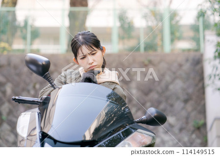  Woman riding a bike 114149515