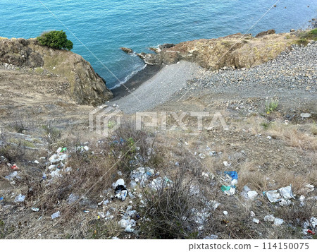 Polluted coastal landscape. Environmental damage from plastic garbage in the ocean. Nha Trang, Vietnam Polluted coastal landscape. Environmental damage from plastic garbage in the ocean. Nha Trang, Vietnam 114150075