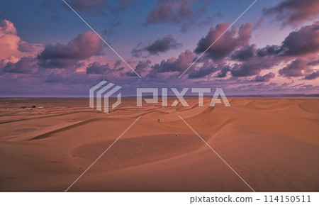 Sahara desert in Mhamid El Ghizlane, southern Morocco in the evening Sahara desert in Mhamid El Ghizlane, southern Morocco in the evening 114150511