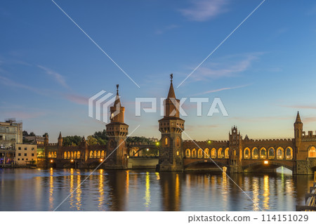 Berlin Germany, sunset city skyline at Oberbaum Bridge and Spree River 114151029