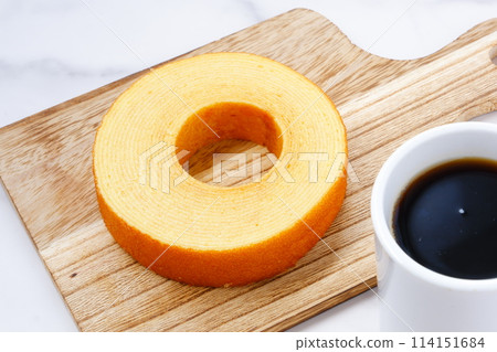 A coffee break with delicious Baumkuchen and freshly brewed coffee A coffee break with delicious Baumkuchen and freshly brewed coffee 114151684